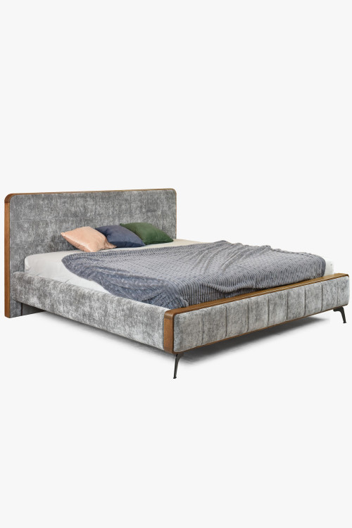 Podwójne łóżko tapicerowane w szarym kolorze na nogach 180 x 200 - 0